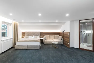 Deluxe dvoposteljna soba z dodatno posteljo v Garni Hotelu Cirman Ljubljana